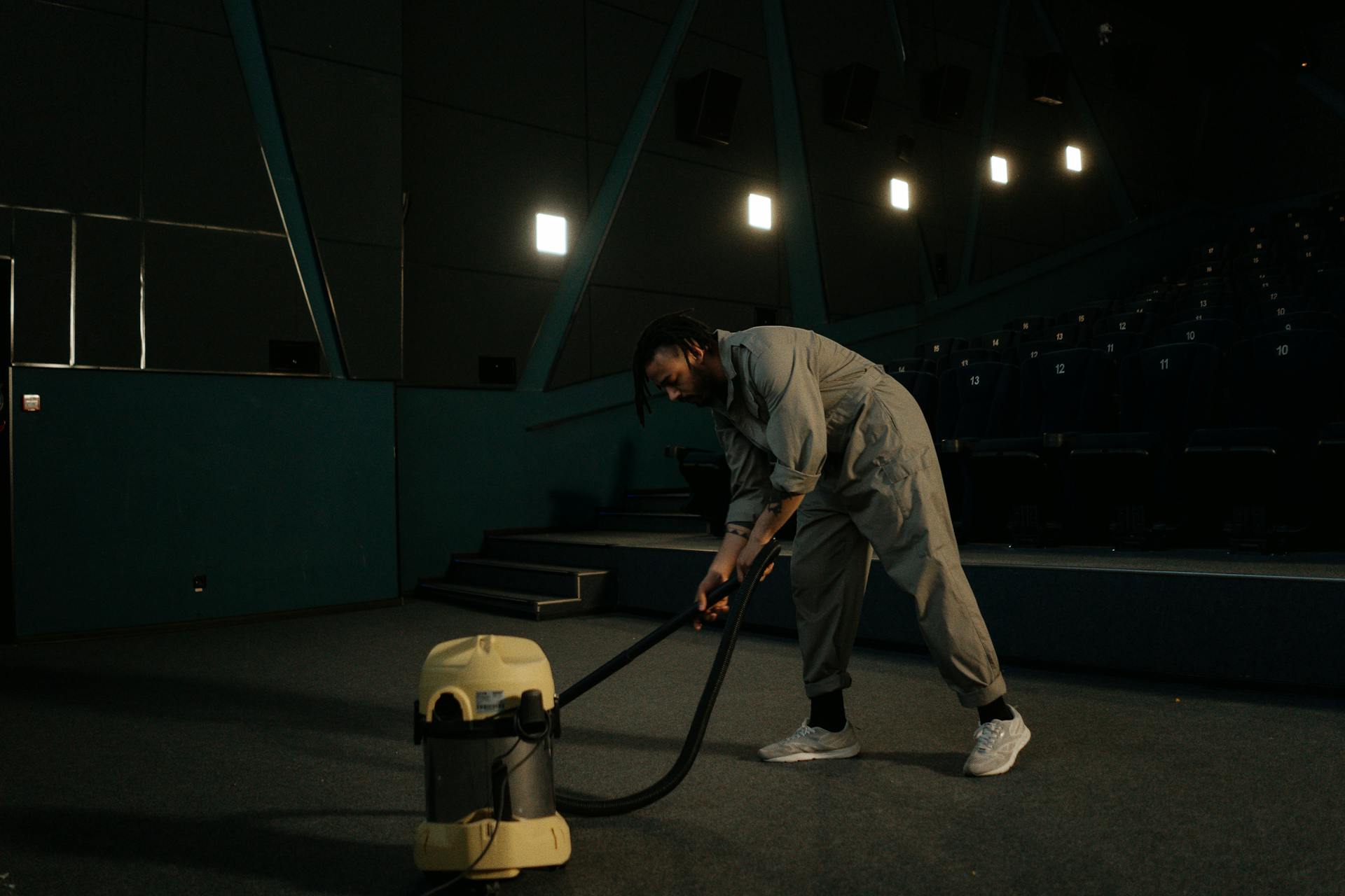 a man cleaning a large area