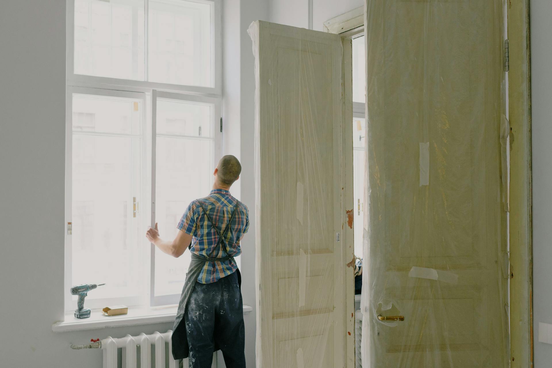 A man cleaning a house