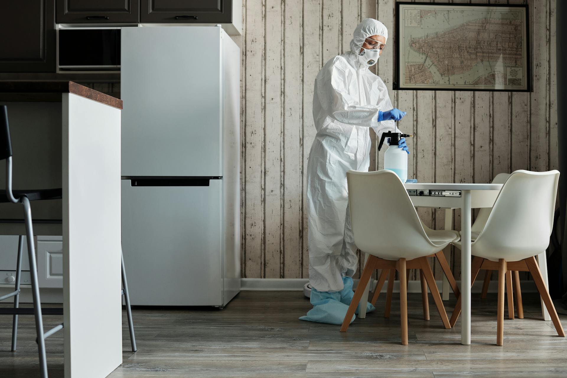 a woman cleaning the table